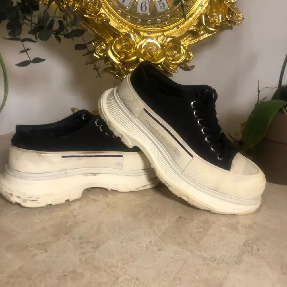 Alexander McQueen black and white platform chucks.